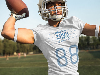 Custom Football Jersey Maker - Quarterback Throwing While at the Field