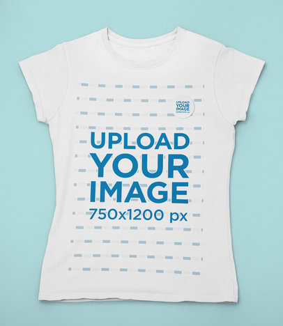 Mockup of a Featuring a T-Shirt with a Sticker Placed on a Colored Surface