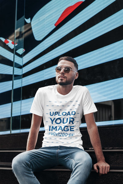 T-Shirt Mockup Featuring a Man with Sunglasses in an Urban Setting 2815-el1